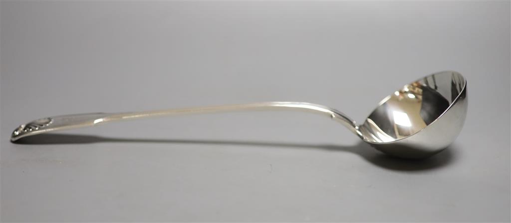 A Victorian silver fiddle, thread and shell pattern sauce ladle, Elizabeth Eaton, London, 1855, 33.5oz, 9.5oz,